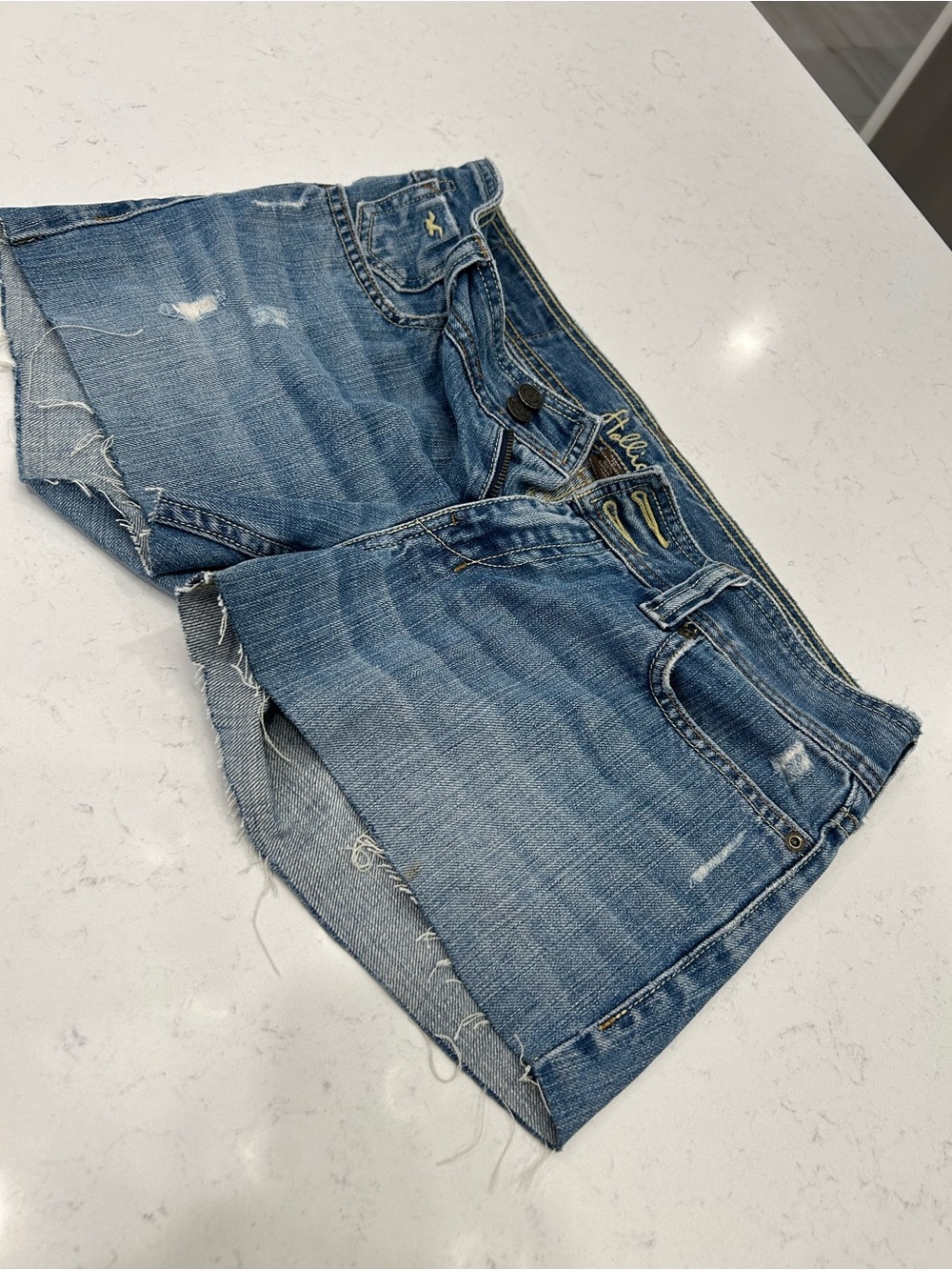 Hollister Blue Denim Jeans with Tan Leather Patch